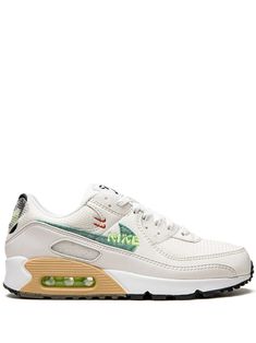 These Nike Air Max 90 are enhanced with transparent heel tabs and graphic hits. They're crafted from a mix of leather and mesh panels, in off-white and light tan shades, while on the sides a Swoosh logo and 'Nike' embroidery adds contrast to the design. Cream Low-top Sneakers For Sports, Cream Sports Sneakers With Laces, Cream Sneakers With Laces For Sports, Nike Cream Low-top Sneakers, Nike Lace-up Sneakers With Cushioned Footbed, Custom Cream Sneakers For Sports, Cream Cushioned Sneakers For Streetwear, Cream Sneakers With Cushioned Footbed For Streetwear, Nike Cream Sports Sneakers