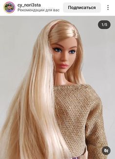 a barbie doll with long blonde hair and blue eyes