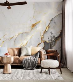 a living room with marble walls and furniture