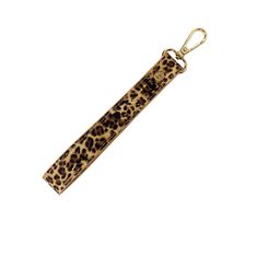 an animal print keychain with a metal hook on the front and back end