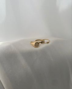 The 14k Solid Gold Signet Ring features a 11 x 9mm oval signet with a faint brushed finish. Carrying years of history, the Signet Ring is a timeless piece that will hold it's value for infinity. Item Details: 14k Solid Gold Size 7 PLEASE NOTE: Our current timeframe for handcrafting this Solid Gold ring is 2-4 weeks before dispatch. Please email us at contact@loveisabelle.com for specific timeframe enquiries. Modern Gold Signet Ring With Oval Cabochon, Modern Gold Oval Cabochon Signet Ring, Gold Oval Ring With Smooth Finish, Classic Rings With Brushed Finish As Gift, Classic Ring With Brushed Finish For Gift, Classic Ring With Brushed Finish As A Gift, Minimalist 14k Gold Oval Cabochon Jewelry, Modern 14k Gold Oval Cabochon Rings, Classic Oval Cabochon Jewelry For Everyday