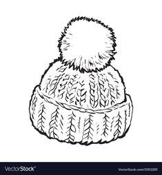 a knitted hat with a pom - pom on the top in black and white