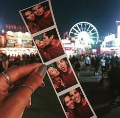 a person holding up two pictures of people in front of a ferris wheel at night