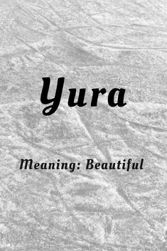 the words yura meaning beautiful are in black and white, against a marble background