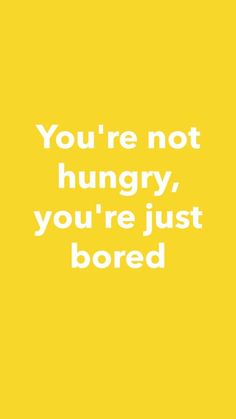 a yellow background with the words you're not hungry, you're just bored