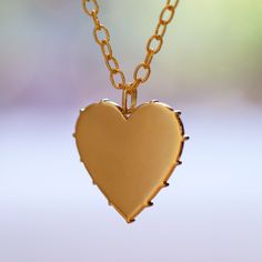 We're in love: the Confetti Heart Multi-Color Diamond Pendant is a playful mélange of glistening brilliant cut natural multi-color diamonds wrapped in a vintage milgrain detail. Personalize with complimentary custom engraving in your choice of font on the flipside of the pendant. Available with or without the chain for greater layering variety. For a lighter touch, try the small size. 18K Yellow Gold Pendant 18K Yellow Gold Medium Twisted Oval Chain 55 Brilliant Cut Natural Multi-Color Diamonds Heart Pendant Jewelry With Engraving Option For Weddings, Heart Pendant Wedding Jewelry With Engraving Option, Luxury Heart Charm Necklace For Wedding, Wedding Heart Pendant Jewelry With Engraving Option, Wedding Jewelry With Engraving Option, Heart Pendant, Classic Polished Heart Necklace For Wedding, Luxury Heart Necklace For Valentine's Day Wedding, Luxury Heart Necklace For Wedding, Engraved Yellow Gold Heart Necklace For Wedding