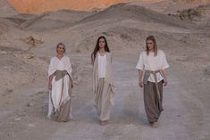 "Meet our relaxed Linen Harem Pants from the \"Desert Hues: Agender Linen Collection.\" These gender-neutral adult pants are all about easy-breezy style, taking inspiration from the calming shades of the desert. Created from soft, breathable linen, these pants are your go-to choice for both comfort and fashion, especially in the hot weather. The fabric's natural texture adds an authentic touch, reflecting the raw beauty of the desert sands. Choose from three natural shades:  1. Classic Natural Flax Color - made of lightweight linen, these pants are the lightest in this collection. 2. Natural Flax and White Melange - made of medium-weight linen. 3. Natural Flax and Gray Melange - made of medium-weight linen, but a little bit heavier and good for the cooler weather.  These natural linen pant Natural Linen Pants, Sarouel Pants, Comic Inspiration, Linen Harem Pants, Breezy Style, Linen Collection, Cooler Look, Raw Beauty, Vintage Life