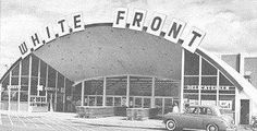 an old car is parked in front of a building with the name willie frontt on it