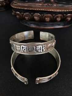 This Cuff Bracelets item by Tibetsjinten has 29 favorites from Etsy shoppers. Ships from Cambridge, MA. Listed on Dec 17, 2023 | Mantra Jewelry Mantra Meditation, Buddhist Mantra, Love And Healing, Mantra Bracelet, Tibetan Bracelet, Om Mani Padme Hum, Cambridge Ma, Mantra, Gold Pendant