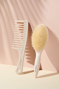 This essential brush and comb duo keeps your hair healthy and looking sleek & chic every day. Bundle includes: Tame & Condition Comb - Delivers ultra-gentle effortless detangling—your go-to detangling tool Finish & Shine Boar Bristle Brush - Boosts the health and shine of your hair while smoothing and taming flyaways. Cute Hair Brush Aesthetic, Hair Brush Product Photography, Hair Brush Photography, Hair Brush Aesthetic, Hairbrush Aesthetic, Hair Tools Aesthetic, Comb Photography, Comb Aesthetic, Boar Brush