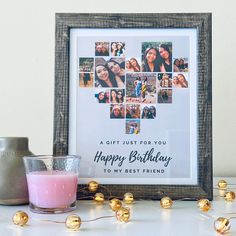 a photo frame with photos and a candle next to it