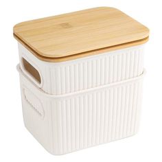 a large white container with a wooden lid