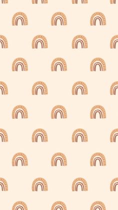 an orange and brown wallpaper pattern with rainbows on the top, in pastel colors