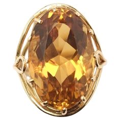 The protagonist of this ring is the citrine quartz. It's oval multifaceted cut exentuates the brightnes and intensity of stone, while the yellow gold settings adds intensity and warmth to the piece. Vintage Citrine Yellow Gold Jewelry, Luxury Oval Citrine Jewelry, Oval Citrine Fine Jewelry, Exquisite Oval Citrine Jewelry, Luxury Citrine Octagon Jewelry, Citrine Jewelry 1stdibs, Hand Ring, Yellow Gold Setting, Ring Ring