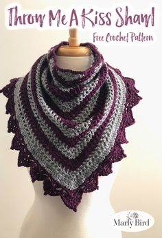 a crocheted shawl on top of a white mannequin head with the words, throw me a kiss shawl free crochet pattern