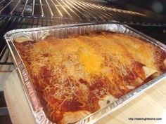 an uncooked casserole is in the oven ready to be baked and eaten