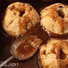 four apple pies with caramel sauce in a pan