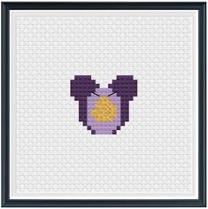 a cross stitch pattern with an image of a purple and yellow object in the middle