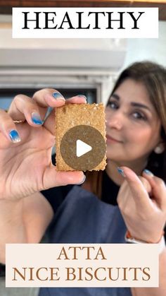 a woman holding up a piece of bread in front of her face with the words, healthy atta nice biscuits