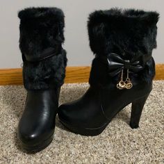 These Black Furry Boots Have Never Been Worn! They Have A 4 Inch Heel And Fur Detail On The Top All The Way Down To About Halfway On The Boot. They Also Have A Faux Leather Strap Around The Halfway Point Of The Fur And A Faux Leather Bow On This Strap. They Also Have Dangling Metallic Cubes Hanging Off The Bows. They Have A Side Zipper To Take On And Off. Where The Fur Is Not The Boots Are Faux Leather. Cowboy Boots And A Dress, 2000s Fashion Boots, Me Too Shoes Boots, Apple Bottom Jeans Boots With The Fur, Winter Boots Heels, Furr Boots, Fur Boots Heels, 2000s Boots, Vinyl Boots