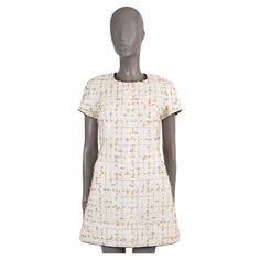 100% authentic Chanel lurex tweed dress in white, beige and gold polyamide (71%), viscose (9%), polyester (8%), cotton (6%) and acrylic (6%). Features a crewneck, slit pocket and short sleeve. Closes with a concealed zipper in the back and is lined in silk (100%). Has been worn and is in virtually new condition. 2019 Spring/Summer Measurements Model 19S P61312 V46745 MG235 Tag Size 38 Size S Shoulder Width 41cm (16in) Bust From 94cm (36.7in) Waist From 82cm (32in) Hips From 94cm (36.7in) Length 80cm (31.2in) Side Seam Length 16cm (6.2in) Sleeve Length 14cm (5.5in) All our listings include only the listed item unless otherwise specified in the description above Chanel White, Tweed Dress, White Beige, Day Dresses, Casual Dress, Casual Dresses, White Dress, Chanel, Sleeve Length