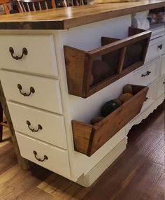 a kitchen island with two drawers on it