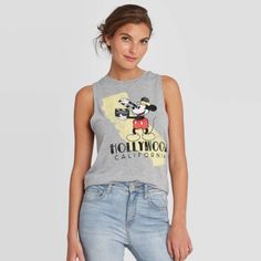 New Lowest Price! Sorry No Lower Offers Can Be Accepted! Brand New With Tags. Women's Disney Round Neck Mickey Hollywood Muscle Graphic Tank Top In Gray. Women's Size Medium. Measurements Are Approximate While Laying Flat: Armpit To Armpit: 17" Length: 24" Front, 26" Back Smoke And Pet Free Home. Style Tags: Cali, California, Hollywood Studios, Disney, Disney World, Mickey Mouse, Disney Shirt, Disney Trip, Disneyland Disney Cotton Tops For Spring, Spring Cotton Mickey Mouse Top, Spring Mickey Mouse Cotton Top, Fun Sleeveless Cotton Tops, Trendy Summer Tops From Target, Mickey Mouse Crew Neck Top For Summer, Fun Graphic Print Tank Top, Casual Cotton Tops From Target, Disney Cotton Tops