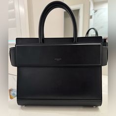 Authentic Givenchy Designer Handbag. In Mint Condition No Flaws! Elegant Black Briefcase With Dust Bag, Designer Black Briefcase With Handle Drop, Chic Tote Briefcase With Dust Bag, Givenchy Bags, Givenchy Handbags, Givenchy Bag, Designer Handbag, Designer Handbags, Mint Condition