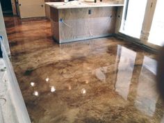 a kitchen that has been cleaned and is in the process of being remodeled with new flooring