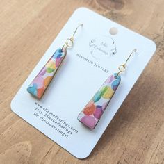 **MADE TO ORDER:  Please allow 3-5 business days to create and ship.  I made these dangle earrings with durable, yet light-weight wooden rectangular-shaped bases and covered each piece front and back with high quality scrapbook paper in a "watercolor" polka dot design (red, orange, yellow, blue, purple, pink).  I hand-painted the earring edges in either gold/silver metallic paint.  They hang on your choice of either stainless steel/sterling silver ear wires unless you choose the gold-filled opti Colorful Earrings As A Gift, Multicolor Rectangular Earrings As A Gift, Multicolor Rectangular Earrings For Gifts, Multicolor Dangle Earrings For Everyday, Multicolor Drop Earrings For Everyday, Everyday Multicolor Dangle Earrings, Multicolor Dangle Earrings, Colorful Dangle Earrings For Gift, Nickel-free Multicolor Rectangular Earrings