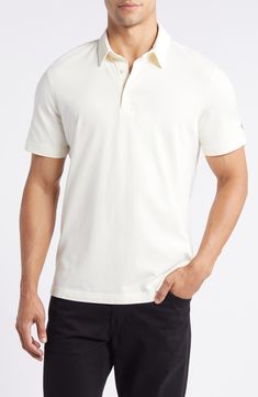 Solid coloring brings easy versatility to a polo crafted for comfort from soft, breathable cotton with a point collar smartly framing the top. 27 1/2" length (size Medium) Button half-placket Point collar Short sleeves 100% cotton Machine wash, tumble dry Imported Men's Clothing Classic Spring Polo Shirt For Golf, Cream Cotton Polo Shirt With Ribbed Collar, Cream Cotton Polo Shirt, Classic Polo Shirt For Spring, Classic Collared Polo Shirt For Spring, White Fitted Polo Shirt With Spread Collar, White Casual Polo Shirt With Seamless Collar, Casual White Polo Shirt With Seamless Collar, Fitted Collared Polo Shirt For Everyday