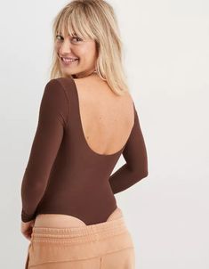 SMOOTHEZ Long Sleeve Bodysuit Solid Loungewear Bodysuit With Lined Body, Lined Loungewear Bodysuit In Solid Color, Solid Color Loungewear Bodysuit With Lined Body, High Stretch Bodysuit With Built-in Bra For Spring, Solid Color Second-skin Lined Top, High Stretch Lined Bodysuit For Loungewear, High Stretch Bodysuit With Lined Body For Loungewear, Spring Second-skin Smoothing Bodysuit, Stretch Bodysuit With Lined Body For Loungewear