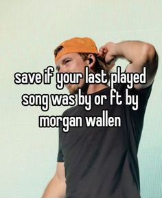 a man wearing an orange hat and black shirt with the words save if your last played song