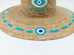 Blue Handmade Hat As Gift, Handmade Blue Hat As Gift, Handmade Blue Hats As Gifts, Handmade Blue Hat For Gift, Traditional Straw Hat For The Beach, Traditional Natural Sun Hat For Beach, Bohemian Straw Hat For Summer Gift, Traditional Handwoven Straw Hat For Beach, Traditional Straw Hat For Beach