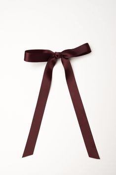 Pretty, flowing satin ribbon bow with beautiful trailing tails 7 lovely color choices Single tied bow - approximate measurement - 6" Long ribbon tails - approximate measurement - 8" Metal spring barrette Ribbon Aesthetic, Satin Hair Bow, Getaway Dress, Plum Hair, Brown Ribbon, Satin Ribbon Bow, Occasion Dresses Wedding, Pre Black Friday, Metal Spring