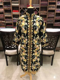 Elegant Embroidered Festive Jacket Dress, Elegant Floral Embroidered Kurta For Winter, Embroidered Fall Designer Wear Sets, Fitted Long Outerwear For Festive Season, Elegant Fall Kurta With Floral Embroidery, Embroidered Fall Designer Sets, Fall Long Sleeve Sets With Intricate Embroidery, Fitted Kurta With Floral Embroidery For Fall, Embroidered Designer Wear Sets For Fall