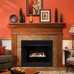 a living room filled with furniture and a fire place in the middle of an orange wall