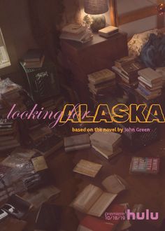 the cover of looking alaska based on the novel by john green, with many books scattered around