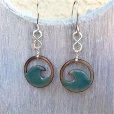 Transparent Seagreen Copper enamel wave eternity earrings – Seaside Harmony Jewelry Ocean-inspired Metal Jewelry, Ocean-inspired Sterling Silver Jewelry With Ear Wire, Green Ocean-inspired Nickel-free Jewelry, Green Ocean-inspired Sterling Silver Jewelry, Handmade Ocean-inspired Earrings For Beach Season, Sterling Silver Ocean-inspired Earrings With Ear Wire, Nickel-free Ocean-inspired Dangle Earrings, Nickel-free Silver Ocean-inspired Earrings, Eternity Symbol