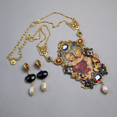 "Inspired by Raphael's \"Madonna\", this spectacular set of pendant with earrings is one-of-a-kind in Baroque style. The center piece is a picture treayed as an old painting (crackled & lacquered). Vintage findings were used: brass stampings & filigrees, lucite & glass cab, and natural pearls. Unique & Exuberant" Raphael Madonna, Pendant With Earrings, Baroque Jewelry, Gold Baroque, Style Baroque, Baroque Style, Old Paintings, Jewelry Lookbook, Set Necklace