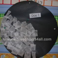 a bulletin board with pieces of paper cut out of it and the words day 1 on it