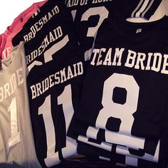 the bride and groom shirts are lined up together