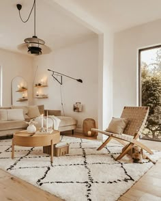 the living room is clean and ready to be used for relaxing time on the couches