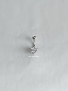 - 14g - 10mm bar - Water resistant - Surgical steel bar - Cubic zirconia star charm Belly Button Piercing Cute, Navel Piercing Jewelry, Industrial Piercing Jewelry, Belly Button Piercing Jewelry, Belly Piercing Jewelry, Belly Button Jewelry, Belly Bars, Navel Piercing, Belly Piercing