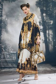 Black and gold silk boxy kaftan with all over regal prints. - Aza Fashions Gold Silk Evening Sets, Gold Evening Sets For Eid, Gold Sets For Evening Eid Festival, Luxury Formal Festive Kaftan, Formal Silk Kaftan For Eid, Gold Silk Evening Kaftan, Elegant Silk Kimono For Eid, Elegant Silk Sets With Kimono Sleeves, Luxury Kaftan For Eid