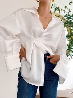 Lightweight oversized blouse that features a singular cross body button for added flair. Model is in MINUSEY ONE SIZE. * MINUSEY ONE SIZE = EU 34-38, US 2-6* 100% Polyester* Dry clean* Made in Korea - Model Height: 172cm/5'7" (US 2, EU 34) Party Blouses, Blouse Dress Outfit, Party Blouse, Polyester Shirt, Maxi Coat, Unique Blouse, Simple Blouse, Oversized Blouse, Women Blouses