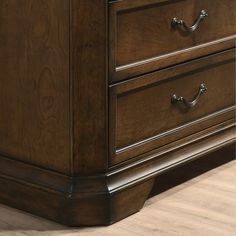 a large wooden dresser with drawers on top of it