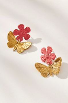 Golden butterflies flutter beneath delicate blooms in pale, springtime hues. Brass with hand painted finish and gold-plated lever backs. Nickel and lead free. 1” [2.5 cm] long. Hand Painted Jewelry For Spring, Spring Hand Painted Jewelry, Spring Gold Jewelry With Butterfly Charm, Drop Chandelier, Fashion Butterfly, Butterfly Earring, Earrings Inspiration, Butterfly Earrings, Earth Friendly