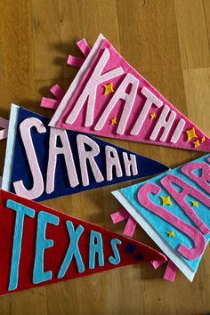 three pennants with the words, kathy sarah, texas and stars on them