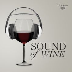 there is a glass of wine with headphones on it and the words sound of wine